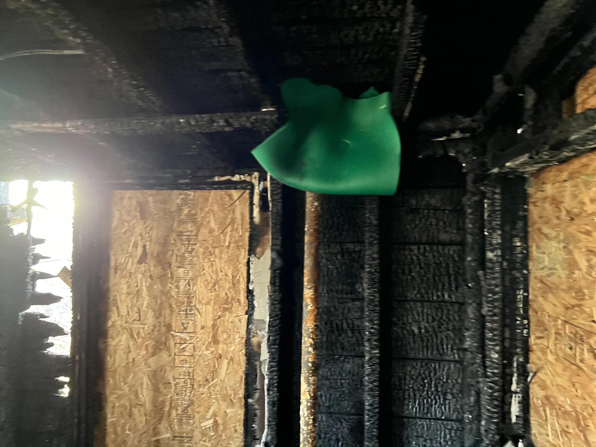 Smoke damage and soot deposition in hallway after fire in Grand Rapids MI home requiring professional smoke odor removal