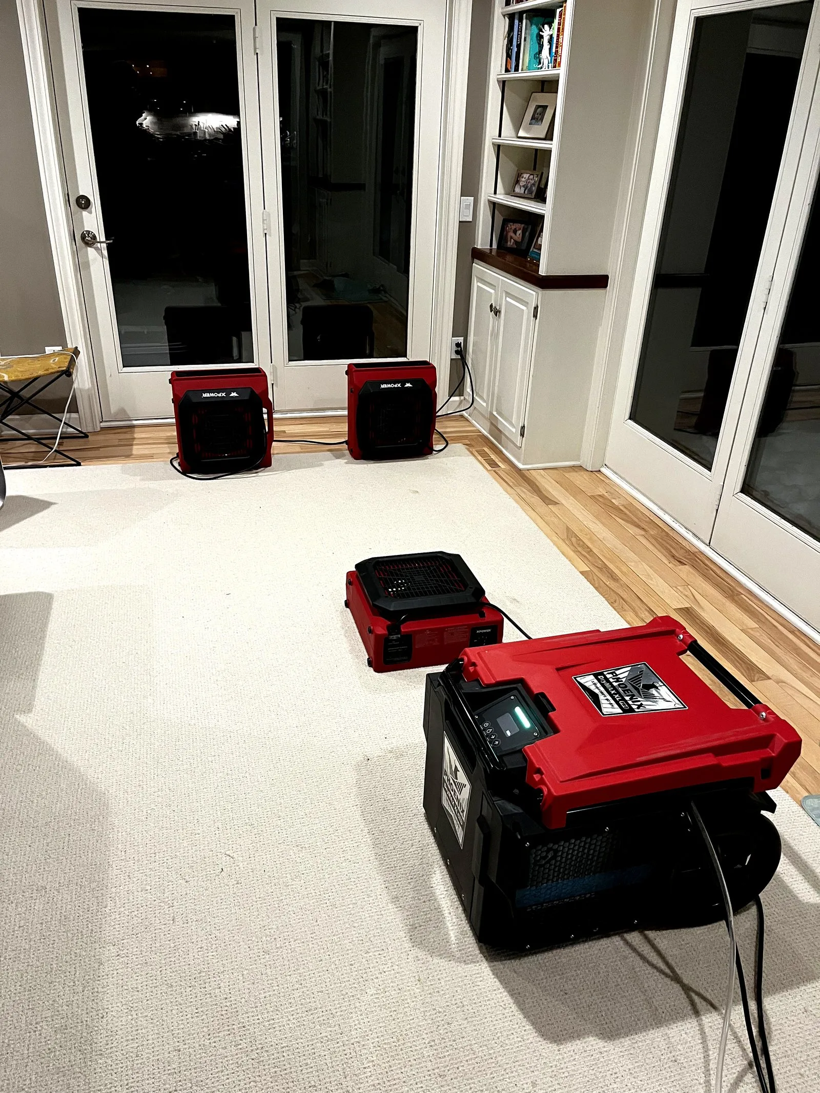 Multiple air movers set up for structural drying — West Michigan