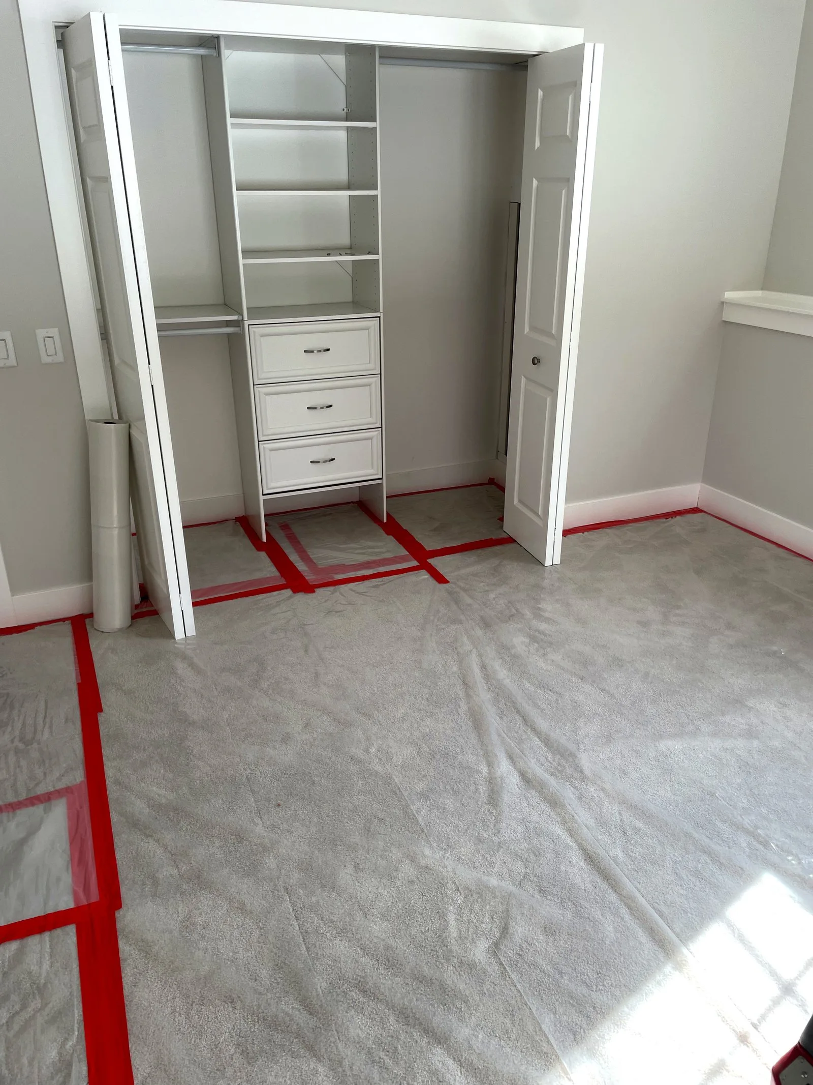 Bedroom containment setup during water damage restoration — Kentwood, MI