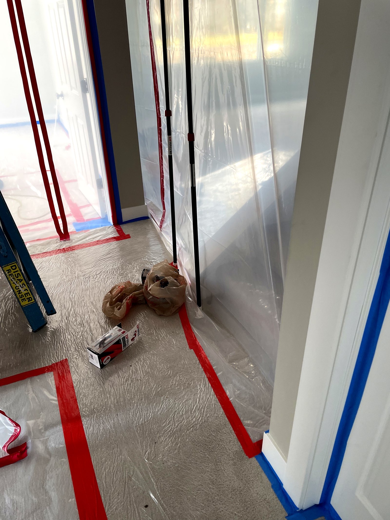 Hallway containment during water damage restoration — Grandville, MI