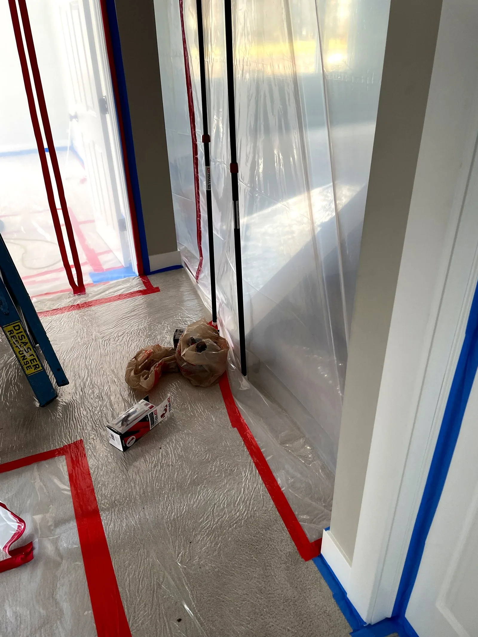 Hallway containment during water damage restoration — Comstock Park, MI